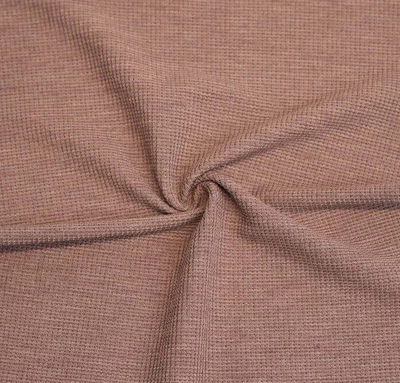 Jak ovlivňuje struktura vafle výkonnost bambusového/polyesterového natahovacího vafle?